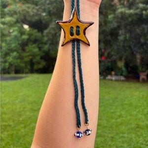 Handmade Whimsical Star Ceramic Charm Bolo Tie with Teal Crochet Cord